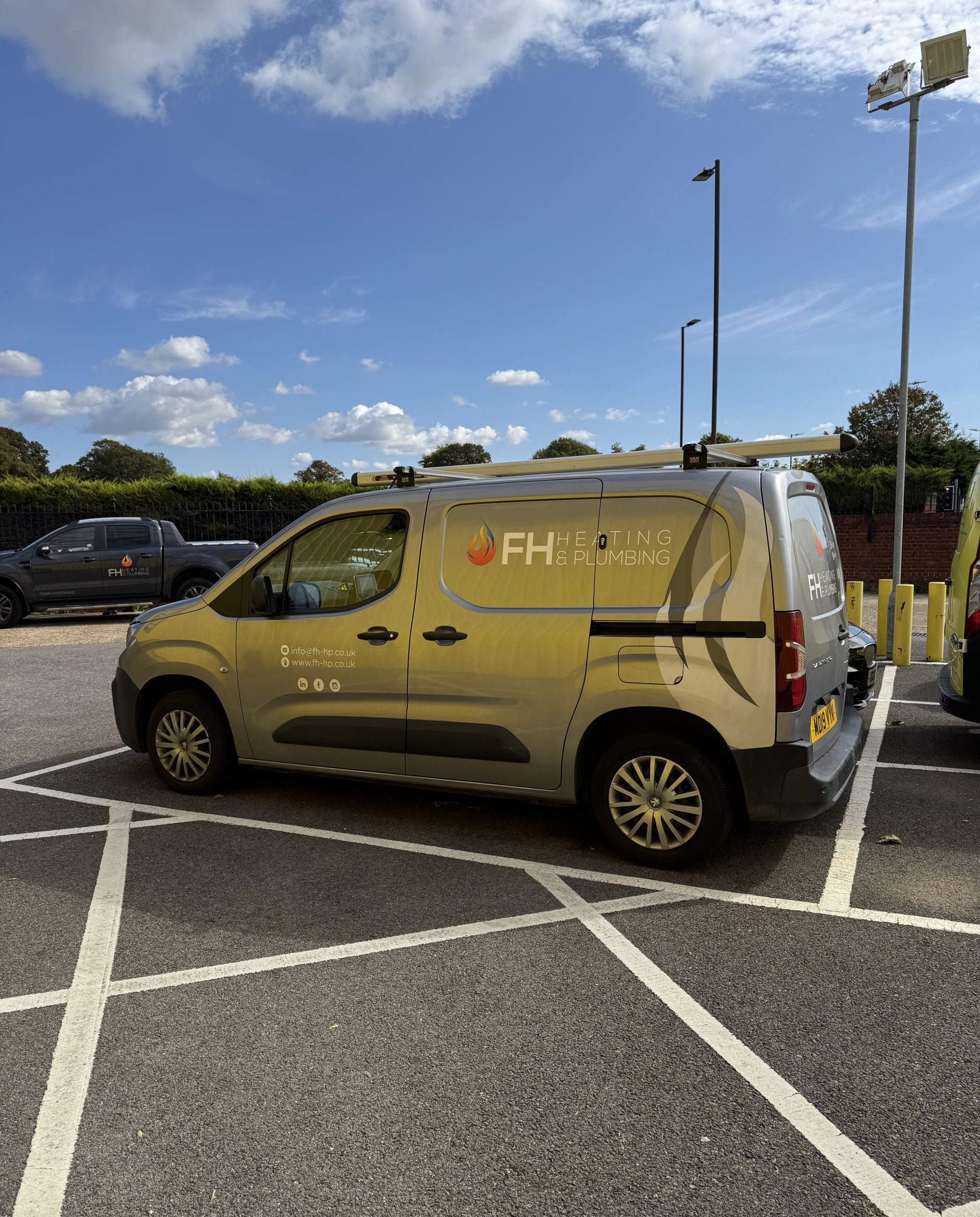 a photo of a truck in a car park