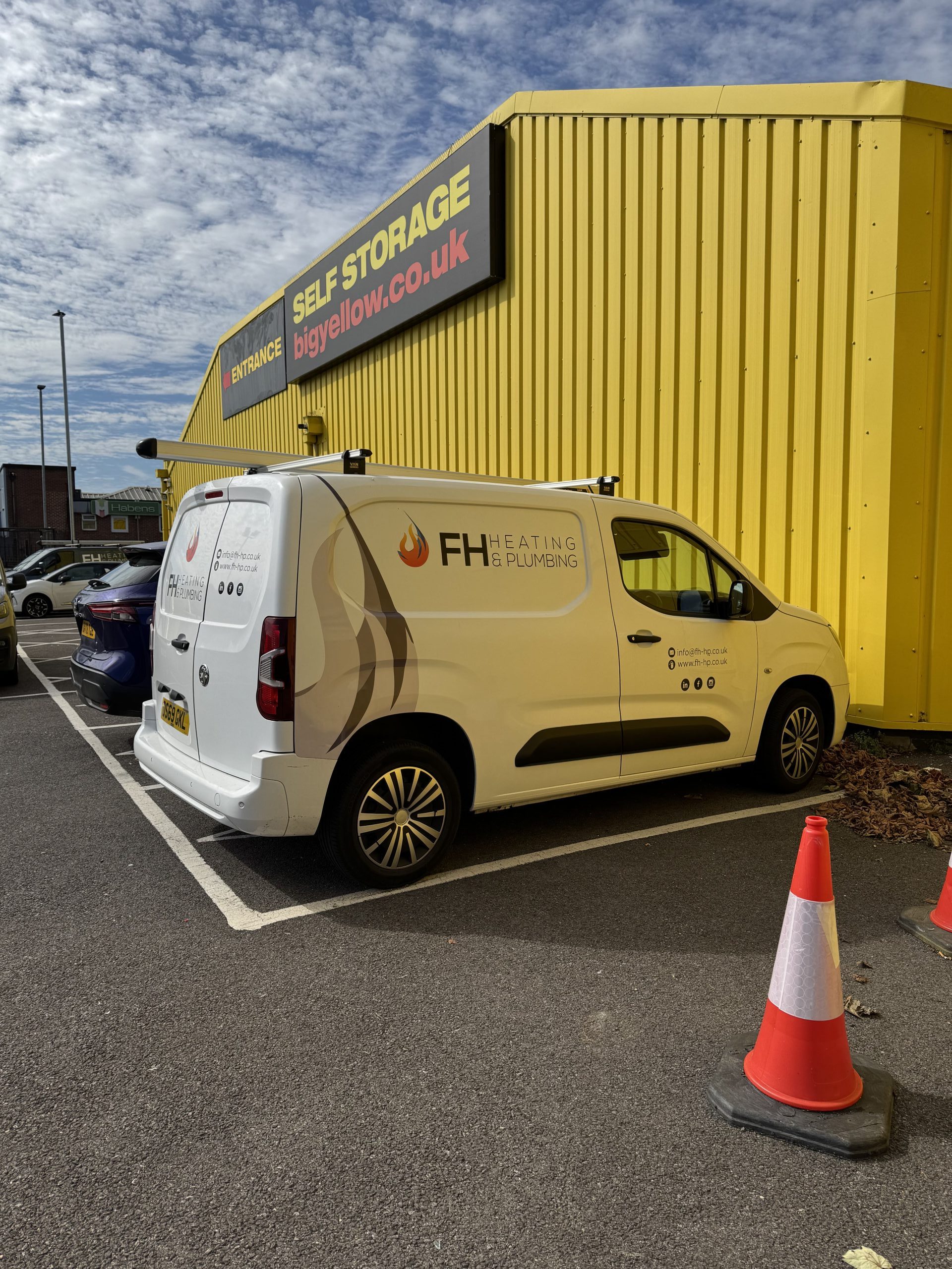 a photo of a truck in a car park